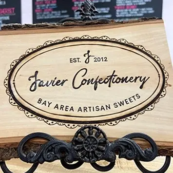 Javier Confectionery sign burned into wood - Bay Area Artisan Sweets, Est. 2012