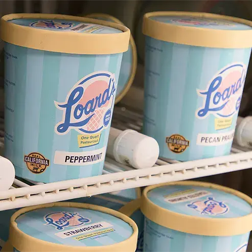 Quart containers of pre-packed ice cream in the cooler